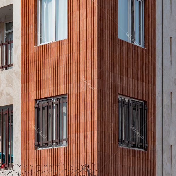 نمای نبش ساختمان با نمای ترکیبی سنگ و آجر انگلیسی قرمز رنگ