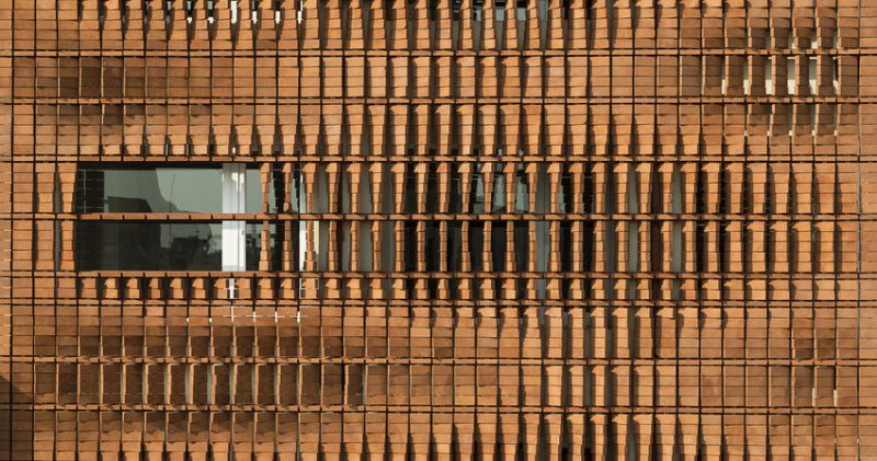 The facade design of Cloaked in Bricks project
